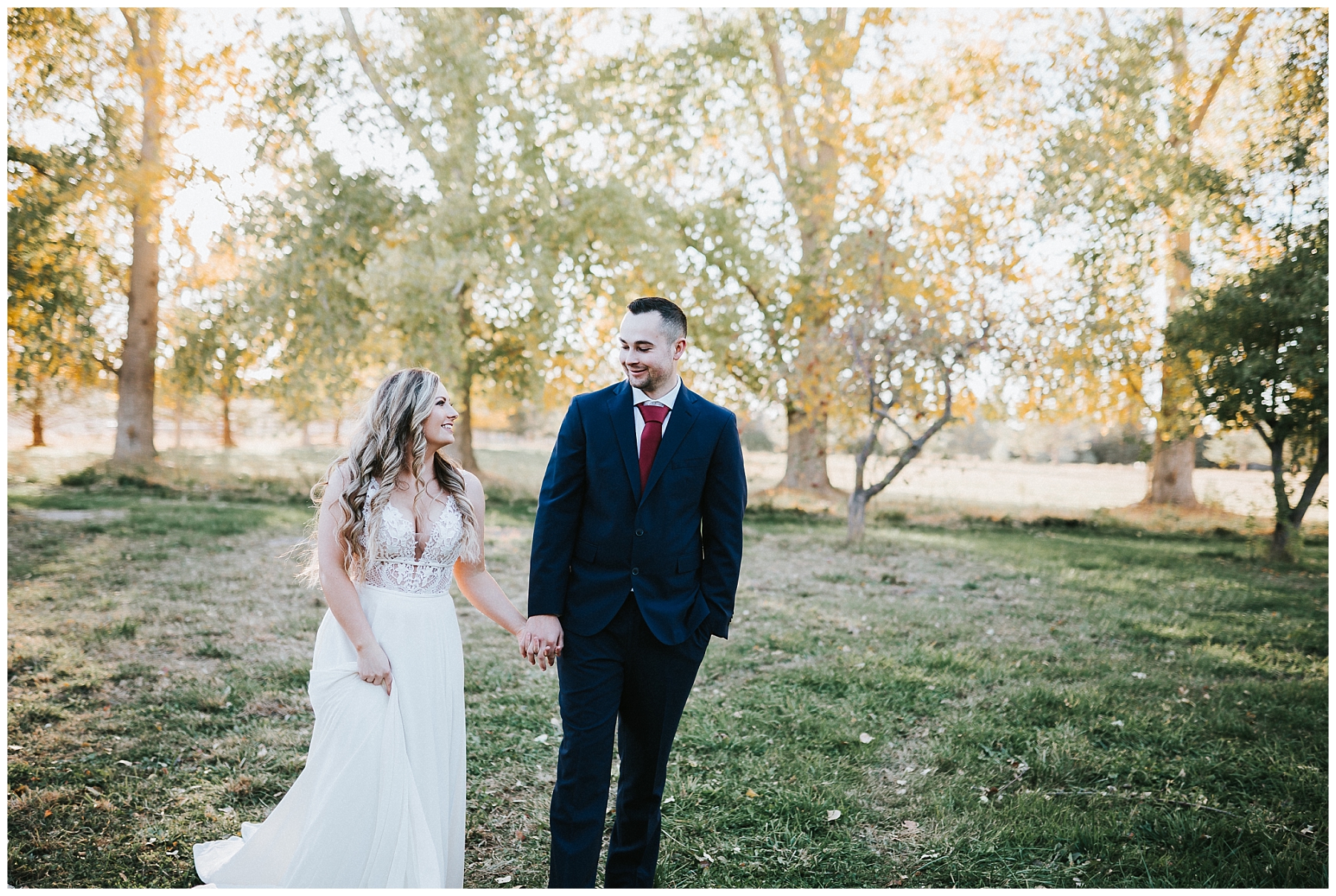 boho-bride-and-groom-twin-falls-idaho-wedding-photographer-finch-film-and-photo-fall-bridals-walking-hand-and-hand-facing-each-other