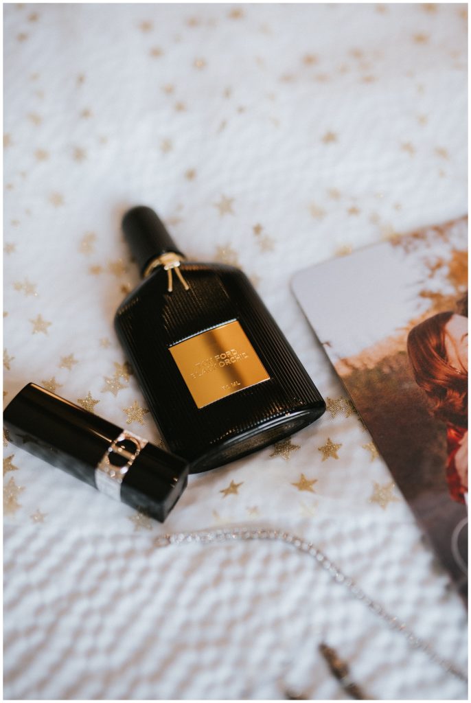 wedding details, flat lay, tom ford perfume and dior lipstick