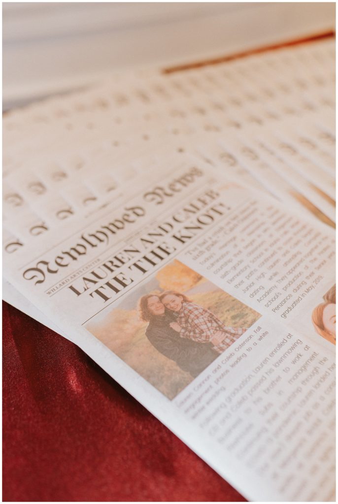 bride and groom had a newspaper made with all of their wedding details