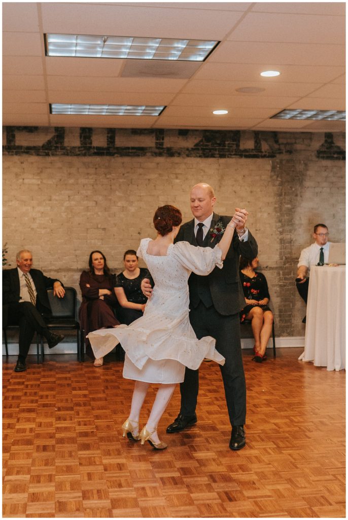 bride dances with dad