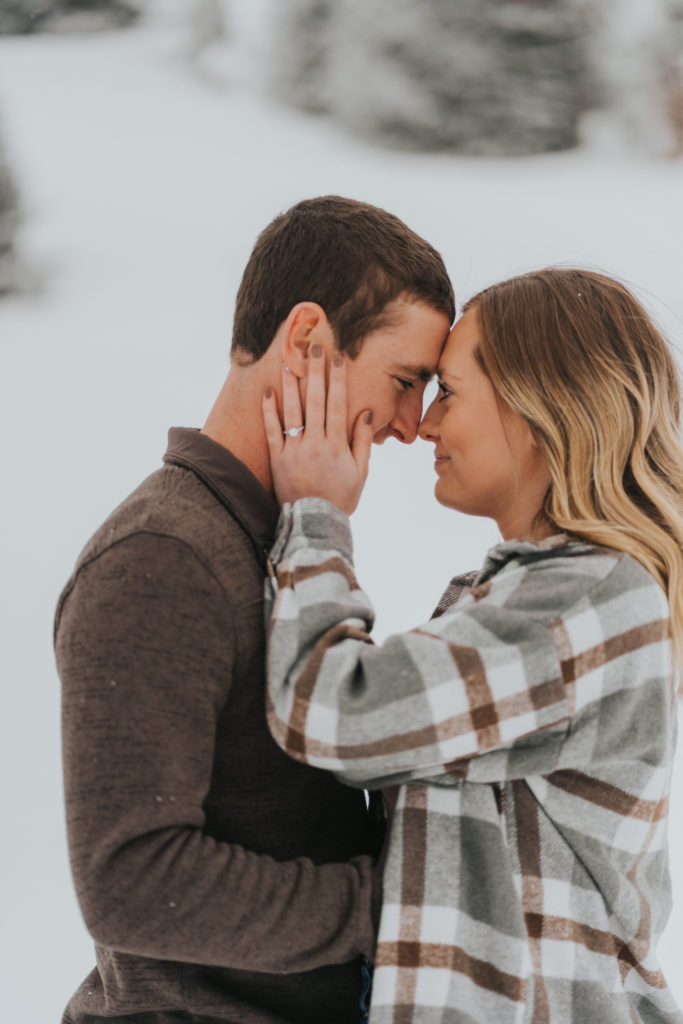 bride and groom touch foreheads and look into each others eyes, twin falls idaho engagement session, winter photography