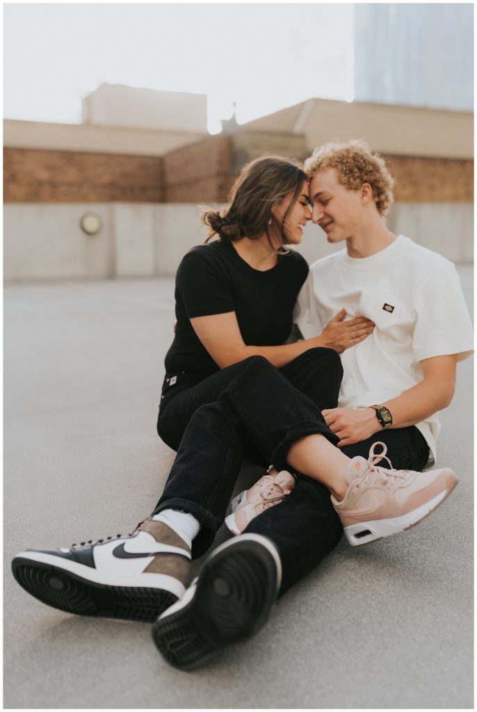 matching nike shoes, engagement session pose ideas, casual engagement picture outfit insp